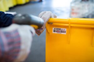 Yellow clinical waste bin with orange lid for anatomical waste disposal