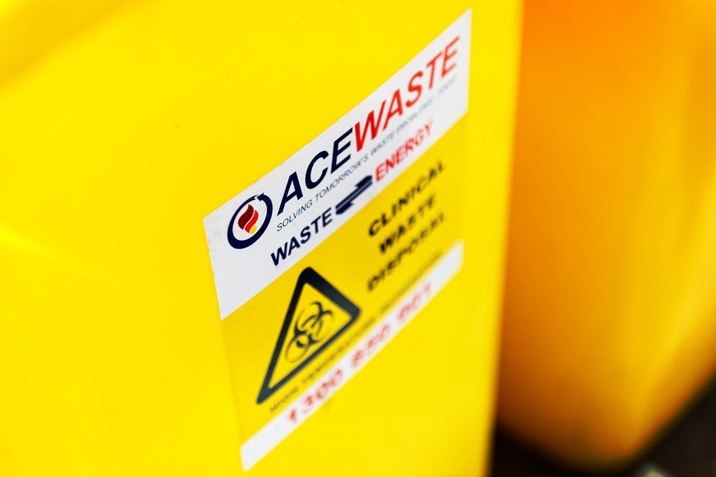 Yellow bin with sticker