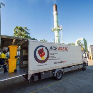 Unloading clinical waste bins from waste collection truck