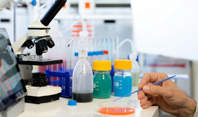 scientist interacting with laboratory waste